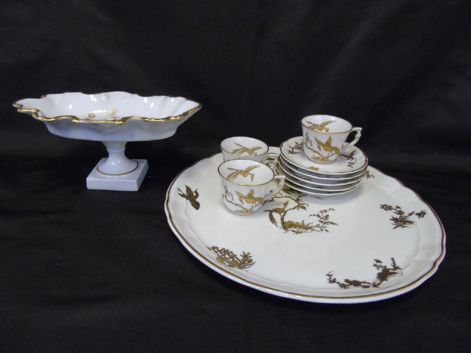 Antique Limoges Bernardaud Reine Elizabeth: Lot of 10 antique Limoges Bernardaud porcelain items. (1) Tray, 12" diameter, (5) saucers, 4 1/4" diameter, (3) demi-tasse cups, 2 1/4" diameter x 2" H, (1) candy dish on pedestal, 8 3/4" W x 5 1/2"D