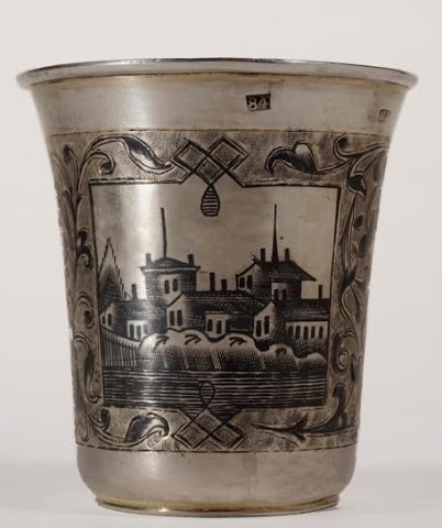 Russian Imperial Silver Niello Cup / Beaker: Imperial Russian silver niello cup, beaker. Both sides with cityscape and floral scroll. Gilt interior. 2 3/4" height ( 7 cm ) , 2 1/2" diameter ( 6,5 cm ). 65 gm Hallmarked and dated 1865.
