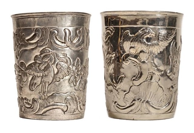 Pair of Russian Silver Circa 18th Century Beakers: Imperial Russian silver repousse 18C two beakers. Both decorated with Eagles and floral foliage. Both hallmarked with Makes Initials, dated 1767 and 1774.Size : 1st - 3 1/2" ( 9 cm ) height , 2 3/4" (