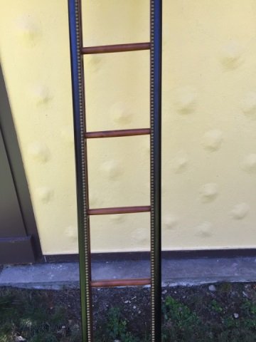 Custom Brass Tack Studded Folding Library Ladder: Custom Brass Tack Studded Folding Library Ladder. Custom made wood folding library ladder. Measures 103 inches in length.