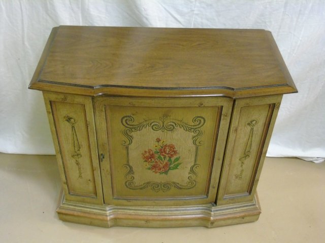 Vintage Magnavox Console Entertainment Center: Vintage Magnavox entertainment center with AM / FM radio, 8 track tape player and turntable. Sides have speaker fabric. Front is pickled wood and painted. 33" W x 16 1/2" D x 28" H.