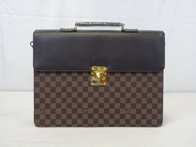 NEW Monogrammed Leather Attache Brief Case: NEW Monogrammed attache case. Two toned brown check with brass hardware. Red cloth interior. (2) inner compartments. (1) zip pocket, (1) small pocket. Interior business card holder and (2) pen holders