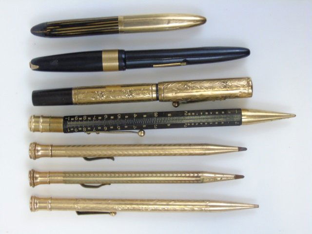 Collection of Antique & Vintage Gold Filled Pens: Collection of Antique & Vintage Gold Filled Pens. Various ages, one with ruler, a few with plastic components. Makers include Roxton, Redipoint, Stratford, Ideal, etc. Largest measures 6.5 inches.