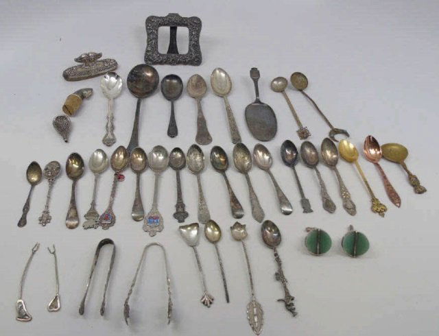 Antique & Vintage Sterling & Silver Articles: Antique & Vintage Sterling & Silver Articles. Spoons, picks, frames, nail buff, cuff links, etc. Various ages and grades of silver from sterling to plate.
