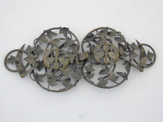Antique Victorian Funereal Mourning Silver Buckle: Antique Victorian Funereal Mourning Memento Mori Silver Belt Buckle. Having a very unique figural design motif of sickles, ivy and hour glasses with angel wings. Silver plate, apparently unmarked. Mea