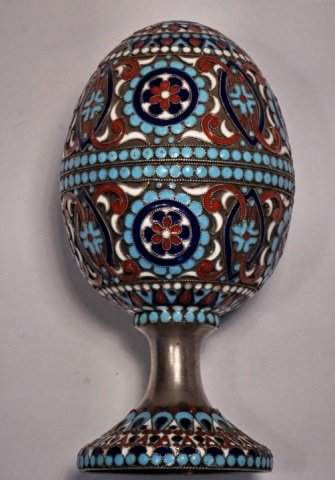 Russian Gilt Silver & Cloisonne Enamel Easter Egg: Russian gilt silver and Cloisonne enamel large Easter egg. The egg consist of two parts with gilded interior. Hallmarked inside. Geometric enamel design around the egg. Size: 4" (10 cm ) height, weigh