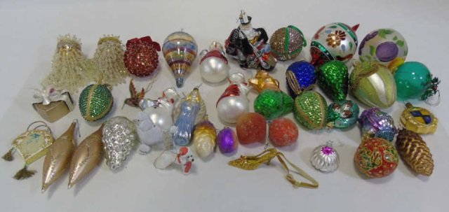 Large Lot Glass Christmas Tree Ornaments Poodles: Lot of approximately 40 glass Christmas ornaments including a motorcycle (with a small break in rear fender), poodles, fruit, pinecones, Santa, a kissing ball and much more. Largest ball is 4" diamete