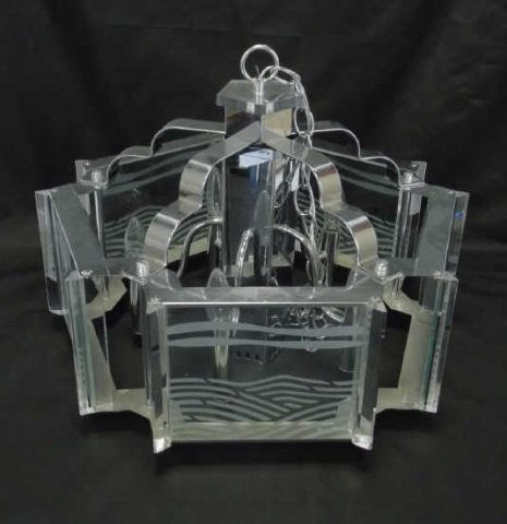 Mid Century Modern Chrome & Lucite Chandelier: Mid Century Modern chrome and lucite chandelier ceiling light fixture. 20" diameter x 17" H.