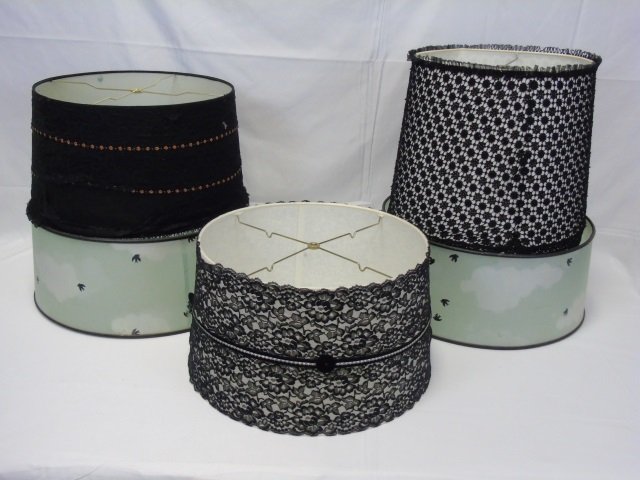 Lot of 5 Vintage Lace Drum Lamp Shades: Lot of five vintage drum shaped lamp shades. Largest is a pair of green sky with small black crows in flight. 19" diameter x 8" H. Also included is a black crochetedlace with beaded tulle edge, 15" di