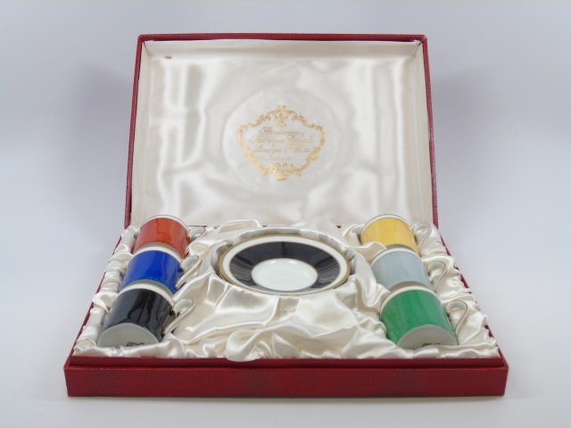 Limoges Contemporary Demitasse Service in Box: Limoges, France contemporary demitasse service in box. Like new, in box. Saucer is 4 3/4" diameter. Cup is 2 1/4" H.