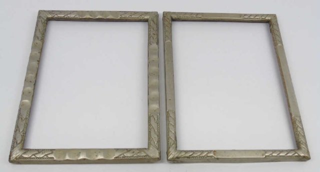Pair Antique Arts & Crafts Style Repousse Frames: Pair Antique Arts & Crafts Style Repousse Frames. Exterior measurements are 8 by 10, interior measurements are 7.5 by 9 inches.