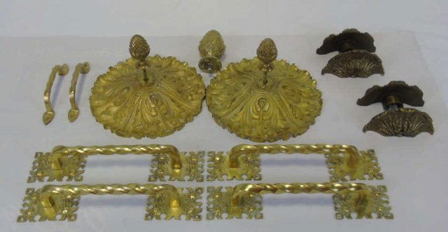 Lot of 11 Decorative Brass Door Pulls Finial: A lot of 11 decorative brass door pulls and one finial. Four pulls measure 11" W x 2 3/8" D 2 1/8" H. Two small pulls measure 6 1/4" W x 3/4" D x 1 5/8" H. Pair brass pulls measure 3 5/8" x 4 3/4" D x