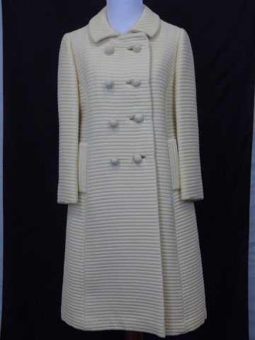 Vintage Saks Fifth Avenue Adolph Blank Coat Sz 6: Vintage beige spring coat. Ribbed cotton blend fabric. Double breasted. Silk buttons. Designed by Adolph Blank for Saks Fifth Avenue. Appears to be a size 6 but not indicated. Shoulder to shoulder mea