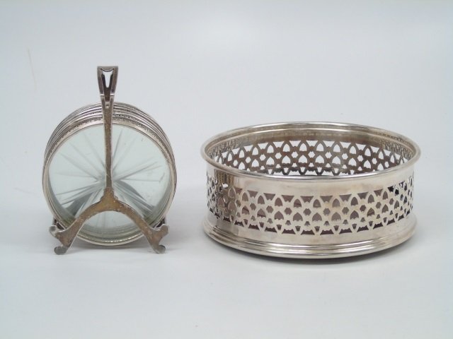 Antique Sterling & Silver Plate Coasters: Antique 19th century sterling silver coasters with holder. Set of six. Lot also includes a reticulated silver plated wine coaster. 5 1/4" diameter x 2" H.