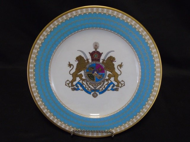Spode Commemorative Plate of Imperial Persia: A SPODE COMMEMORATIVE BONE CHINA IMPERIAL PLATE OF PERSIA, LIMITED EDITION, GILT MAKER'S MARKS, 1971, the parcel gilt and polychrome enameled dinner plate with a gilt rim and conforming border of cont