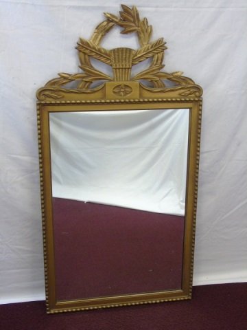 Vintage Gold Painted Carved Wood Mirror w/ Laurel: Vintage gold painted carved wood mirror. Laurel wreath and feather and quill detail. Bead detail around mirror frame. 48" H x 25" W.