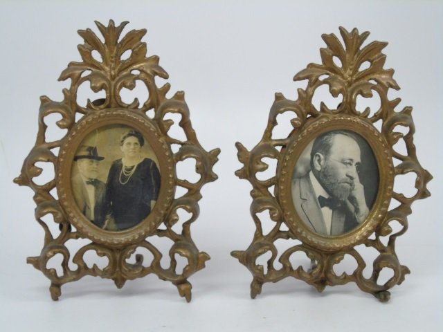 Pair of Antique Victorian Brass Frames: Pair of Antique Victorian brass picture frames. Rococo ornate style. Oval has beaded detail. 5 1/2" W x 8" H.