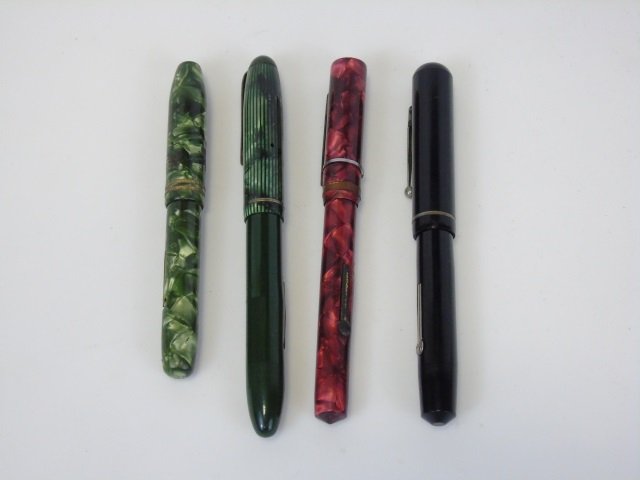 Lot of 4 Vintage Fountain Pens: A lot of four vintage fountain pens. Various, Ink-D-Cator, Venus and Waltham. The largest is 5" long. Good vintage condition.
