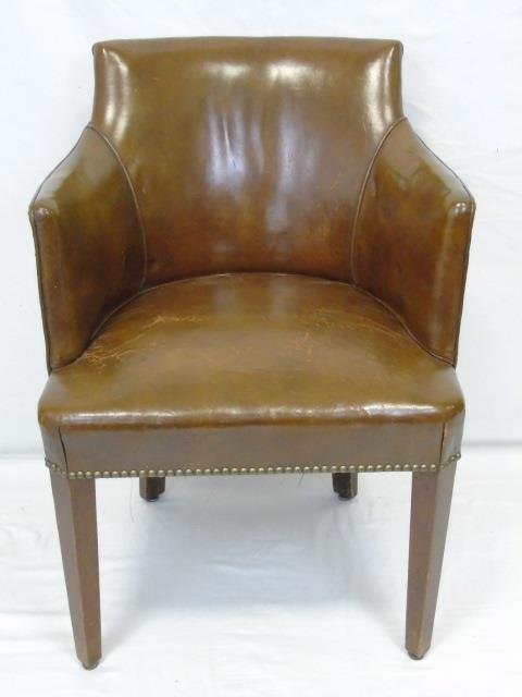 Brown Leather Occasional Chair: Brown leather occasional chair. Nail head trim. Tight seat and back. 23" W x 20" D x 33" H.