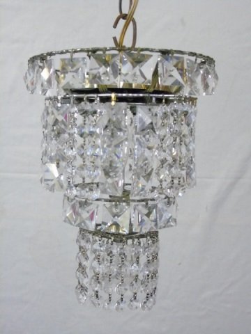 Vintage Crystal Chandelier Light Fixture: Vintage crystal chandelier. Four lights. Four tiers. Various shaped crystals. Fixture alone is 11" H x 8" diameter.