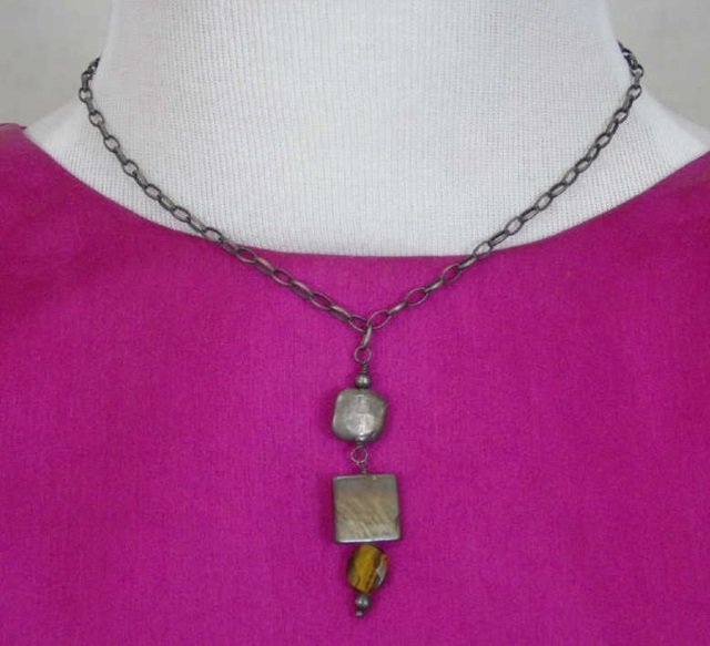Handmade Artisan Sterling & Cats Eye Necklace: Handmade Artisan Sterling & Cats Eye Necklace. Hallmarked and signed. Chain measures 16.5 inches.
