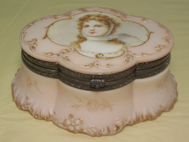 Rare Pairpoint Pink Covered Box w/Ormolu Frame: A rare Pairpoint pink covered box with ormolu frame depicting Queen Louisa. Fully lined. 7 1/2" W x 6" D x 2 7/8" H. Very good condition. Shipping available within the Continental USA (excludes insura