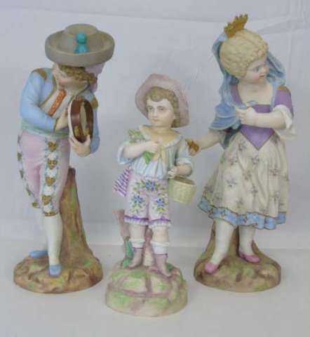Antique German Hand Painted Bisque Rudolstadt: Antique German Hand Painted Bisque Rudolstadt Rustic Romantic Figurines. By the makers of Piano Babies Figurines. Tallest is 15" tall x 6" diameter.