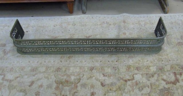 Antique Gilt Brass Fretwork Fireplace Fender: Antique Gilt Brass Fretwork Fireplace Fender. Late 19th / early 20th century. Measures 53 by 12 inches.