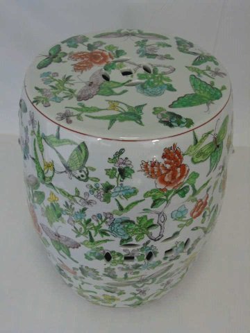 Chinese Painted Porcelain Garden Stool: Chinese painted porcelain garden stool. Multi-color flowers and butterflies. 12" diameter x 18" H.