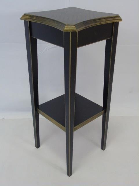Painted Black w/ Gold Pedestal / End Table: Painted black with gold detail small end "drinks" table. Shaped top with Napoleonic bee. One shelf. Tapered legs. 10" X 10" x 24" H.