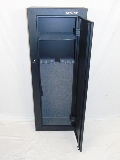 Sentry Metal Rifle / Gun Safe Five Feet Tall: Sentry metal rifle / gun safe. Made by Sentry. Locks with a key. Interior holds eight rifles. Upper shelf. 21" W x 10" D x 55" H.