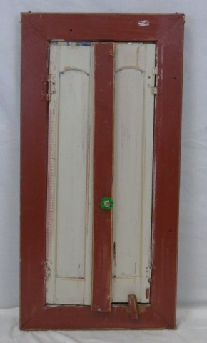Vintage Painted Shutter Mirror: Vintage painted shutter mirror. Red with beige inset paneled shutters that open to reveal a mirror. Green crystal knob. Distressed finish due to age. 19" W x 40" H.