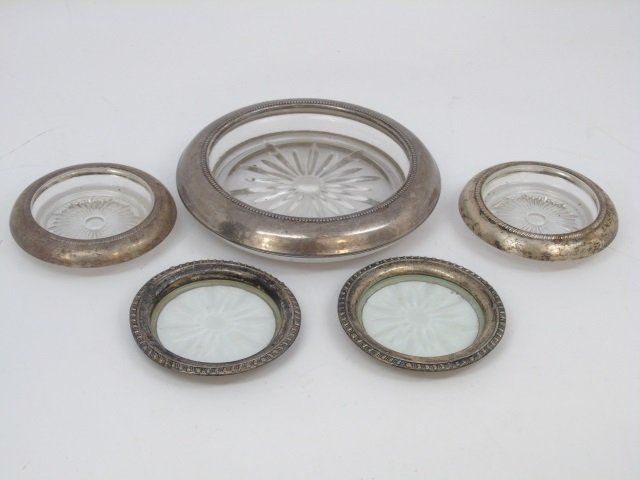 5 Sterling Silver & Brilliant Glass Wine Coasters: 5 Sterling Silver & Brilliant Glass Wine Coasters. Wine coasters and glasses coasters. Sterling / silver rims. Largest measures 7 inches in diameter.