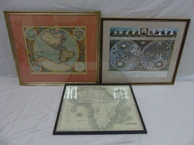 Three Vintage Framed World & African Maps: Three Vintage Framed World & African Maps. One with silver leaf and Latin, one hand colored on parchment type paper, one showing African. Largest measures 23 by 26 inches.