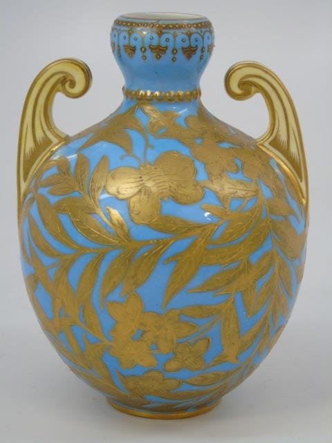 Antique English Porcelain Vase Marked Abram French: Antique English Porcelain Vase Marked Abram French. Robin egg blue background with gold decoration. Measures 5.5 inches in height.