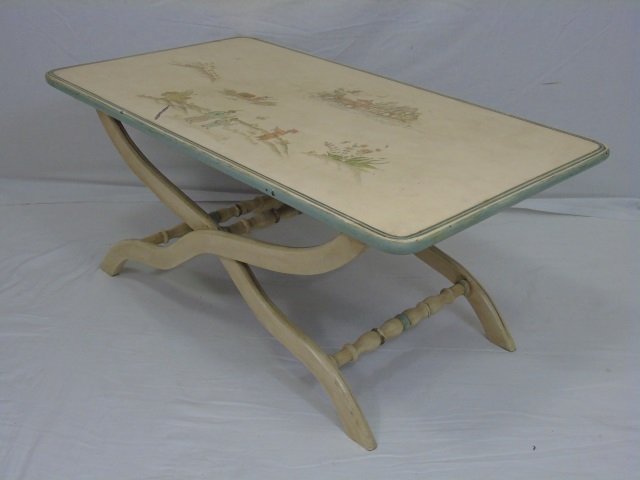 Painted Wood Coffee Table Chinese Scene X-leg: Painted wood coffee table. X legs with turned stretcher. Top has a Asian scene. 39 1/2" W x 22" D x 17" H.