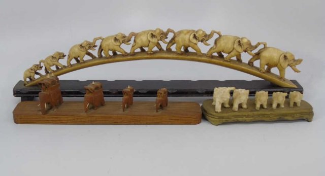 Set of 3 Graduated Size Elephant Parade Statues: Set of 3 Graduated Size Elephant In-Line or Parade Statues. Cow bone, resin and wood. Largest measures 20 inches in width at base.