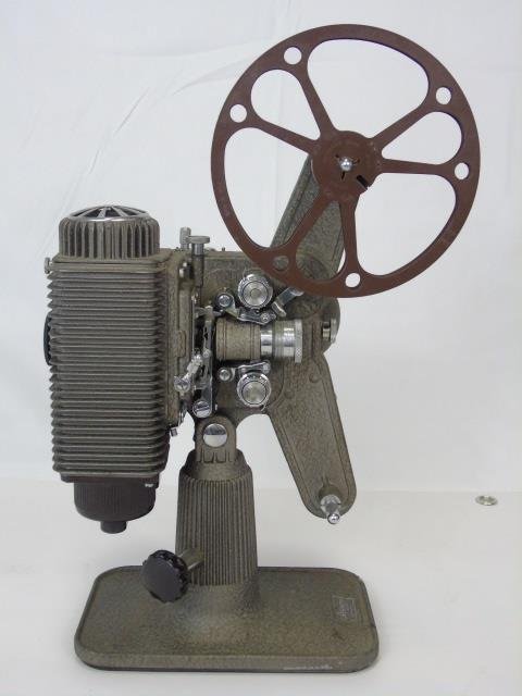 Vintage Revere Eight MM Film Projector: Vintage Revere Eight MM Film projector. 12 1/2" W x 7 1/2" D x 14 1/2" H.
