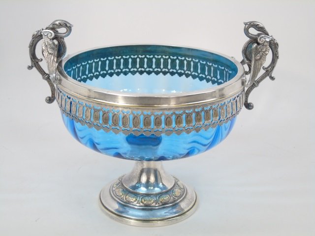 Antique Baroque Revival Blue Glass Figural Compote: Antique Baroque Revival Blue Glass Figural Compote. Blue blown glass. Figural griffin handles. Measures 8.5 inches in height, 10 inches in width.