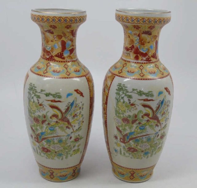 Pair of Chinese Painted Porcelain Vases: Pair of Chinese Painted Porcelain Vases. Oranges and reds birds and flowers motif. 4" diameter x 10" H.