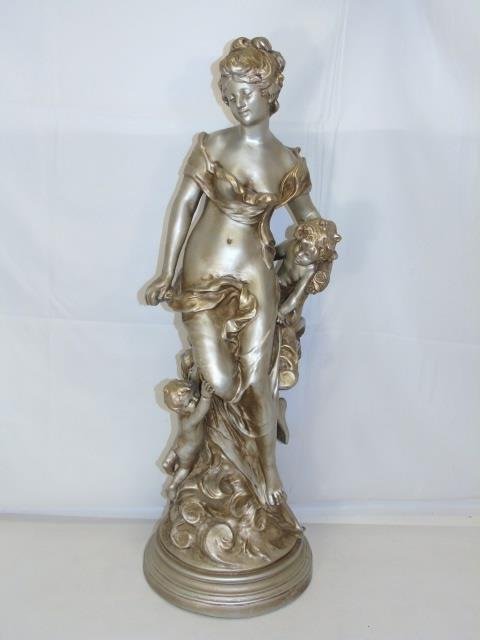Large Silver & Gold Leaf Mother & Child Statue: Large Silver & Gold Leaf Mother & Child Statue. Neo Classical style. Measures 35 inches in height.