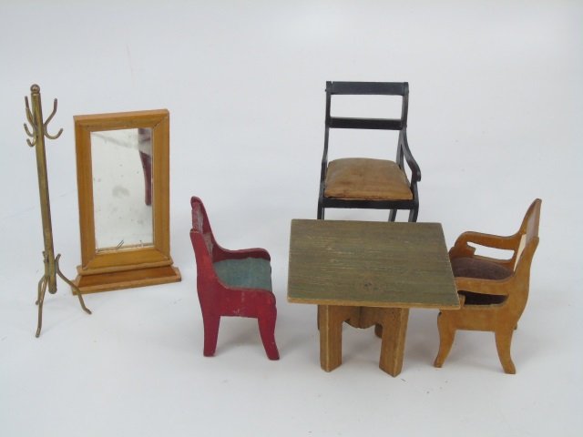 Antique German Dollhouse Miniature Furniture: Antique German Dolls House Miniature Furniture. Three chairs, table with gold stencil, schneegass mirror and gilt metal coat stand. Largest chair is 4 inches in height.