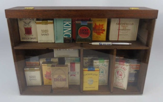 Collection of Vintage Cigars in Original Packaging: Collection of Vintage Cigars in Original Packaging. Many still sealed. In store display case that measures 16 x 11 inches.