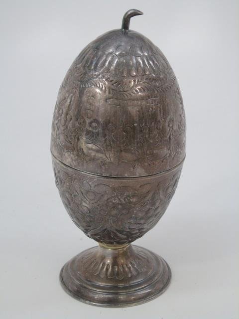 Antique Silver Etrog Judaica Egg Form Box: Antique Silver Etrog Judaica Egg Form Box. Hebrew inscription. Apparently unmarked. Likely 800 or less silver. Carved bone disc bone at base. Measures 7.75 inches, 3.25 inches in diameter.
