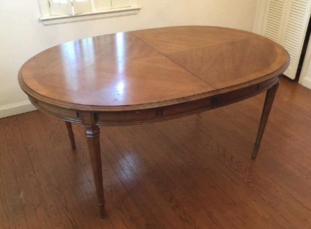 Vintage Drexel Louis XVI Style Dining Table: Vintage Drexel Louis XVI Style Dining Table. Banded and parquetry wood top. Measures 29 x 64 x 44 inches.