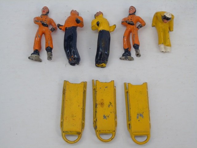 Antique Painted Metal Toy Skaters/ Sleds w Figures: Antique Painted Metal Toy Skaters/ Sleds w Figures. Each sled measures 2.75 inches in length.
