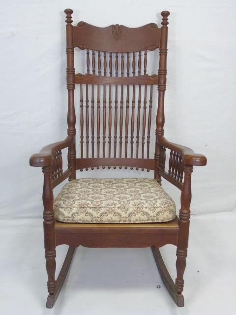 Antique American C 1900 Carved Wood Rocking Chair: Antique American C 1900 Carved Wood Rocking Chair. Fretwork / spindle design. Measures 47 x26 x 30 inches.