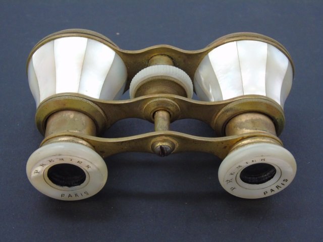 Antique Paris Mother of Pearl Opera Glasses: Antique Paris Mother of Pearl Opera Glasses by Premier. Measures 4 inches in width.