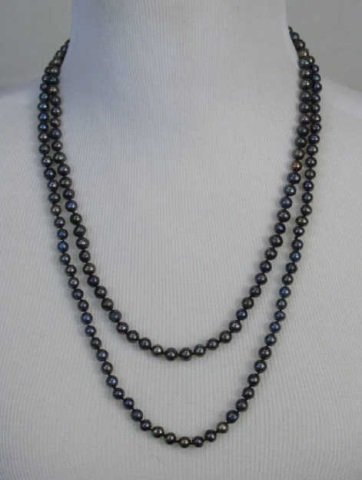50 Inch Cultured Tahitian Black Pearl Necklace: 50 Inch Cultured Tahitian Black Pearl Necklace Strand. Beaded cultured pearls in dark gray, black and silvery tones.