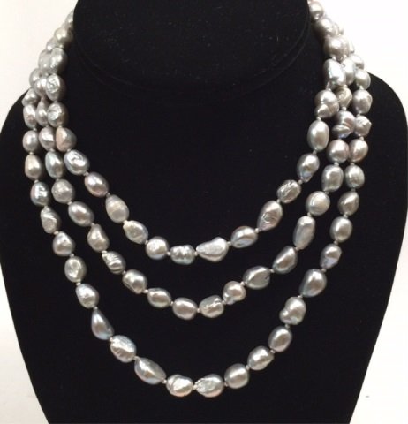 50 Inch Baroque Cultured Pearl Necklace Strand: 50 Inch Grey / Silver Baroque Cultured Pearl Necklace Strand. Hand knotted silk thread with silver tone clasp.